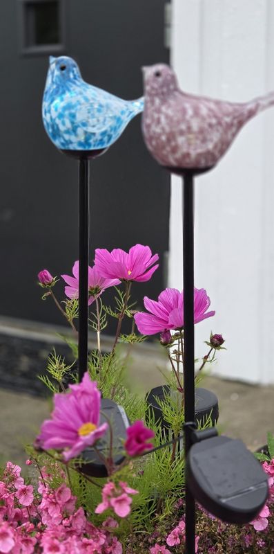 Blomsterpinne glassfugl lilla